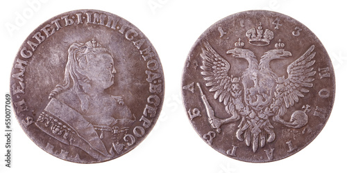 A Russian silver coin with a value of 1 ruble in 1743. Two sides of the coin on a white background. Isolated