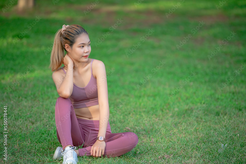 Asian beautiful slim woman at the park,Young girl love healthy exercise,Teen wear sportswear Asian beautiful slim woman at the park,Young girl love healthy exercise,Teen wear sportswear