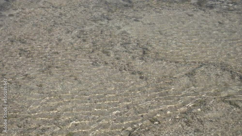 Sun Glare On The Water. Natural Background With Sun Glints On Surface Of Water. Sun Glare On The Water. Natural Background With Sun Glints On Surface Of Water.
