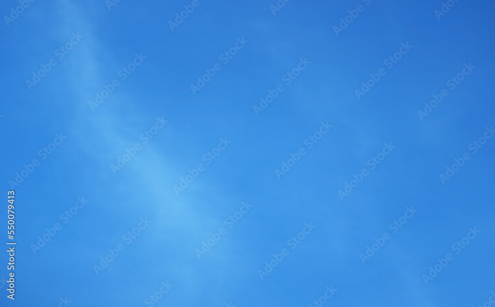 Beautiful Clouds Spreading Across the Vibrant Blue Sky Beautiful Clouds Spreading Across the Vibrant Blue Sky
