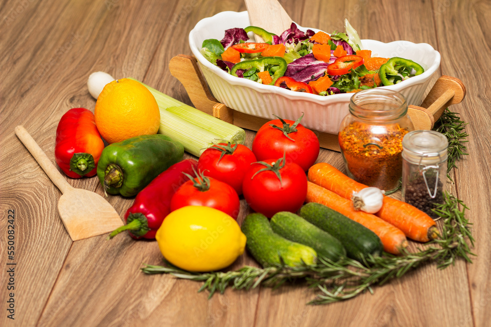 Healthy and fresh salad in bowl with vegetables and fruit Healthy and fresh salad in bowl with vegetables and fruit