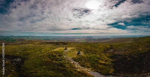 Standing stones at Mullaghcarn mountain from the top viewpoint in Gortin Glens Forest Park photo