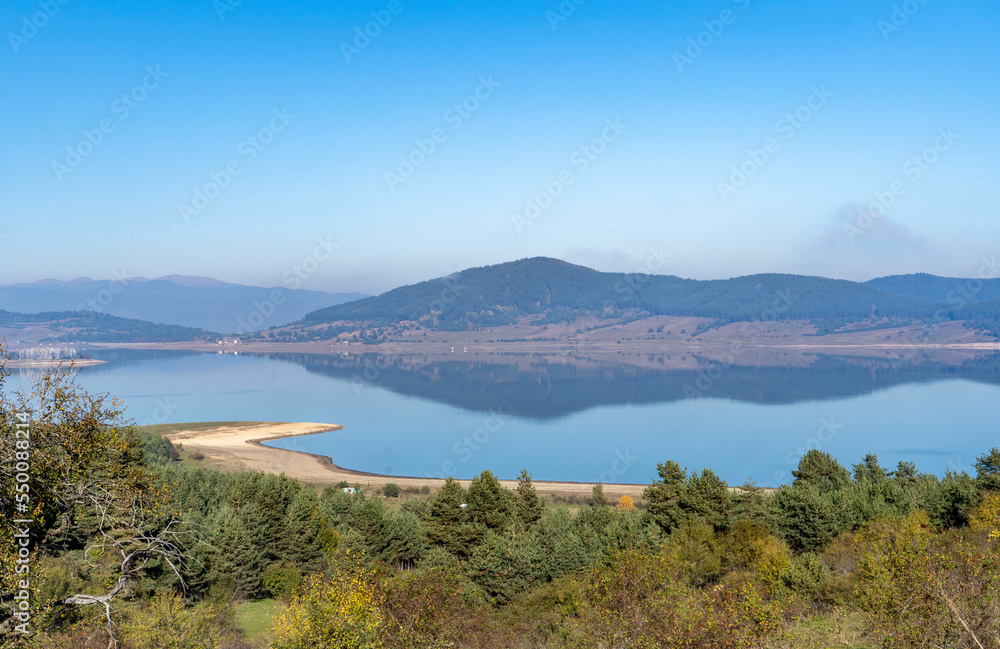 View of Batak Dam and reflection of mountains in the dam.Bulgaria
