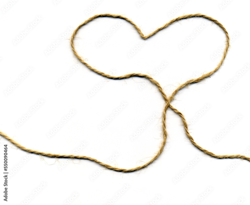 Heart silhouette made with packing twine. Love and connection symbol isolated on white. Frame with copy space Heart silhouette made with packing twine. Love and connection symbol isolated on white. Frame with copy space