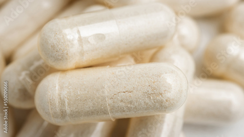 White medicine capsules, vitamin pills or drugs, medication treatment, health care concept