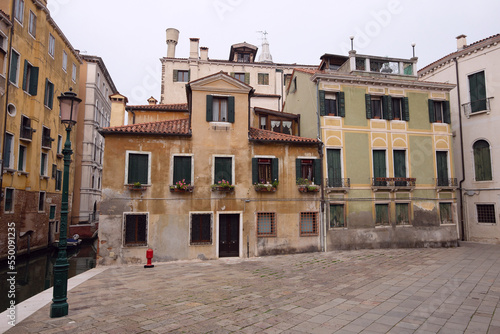 Venice. Old medieval facades of traditional Venetian houses. © pillerss