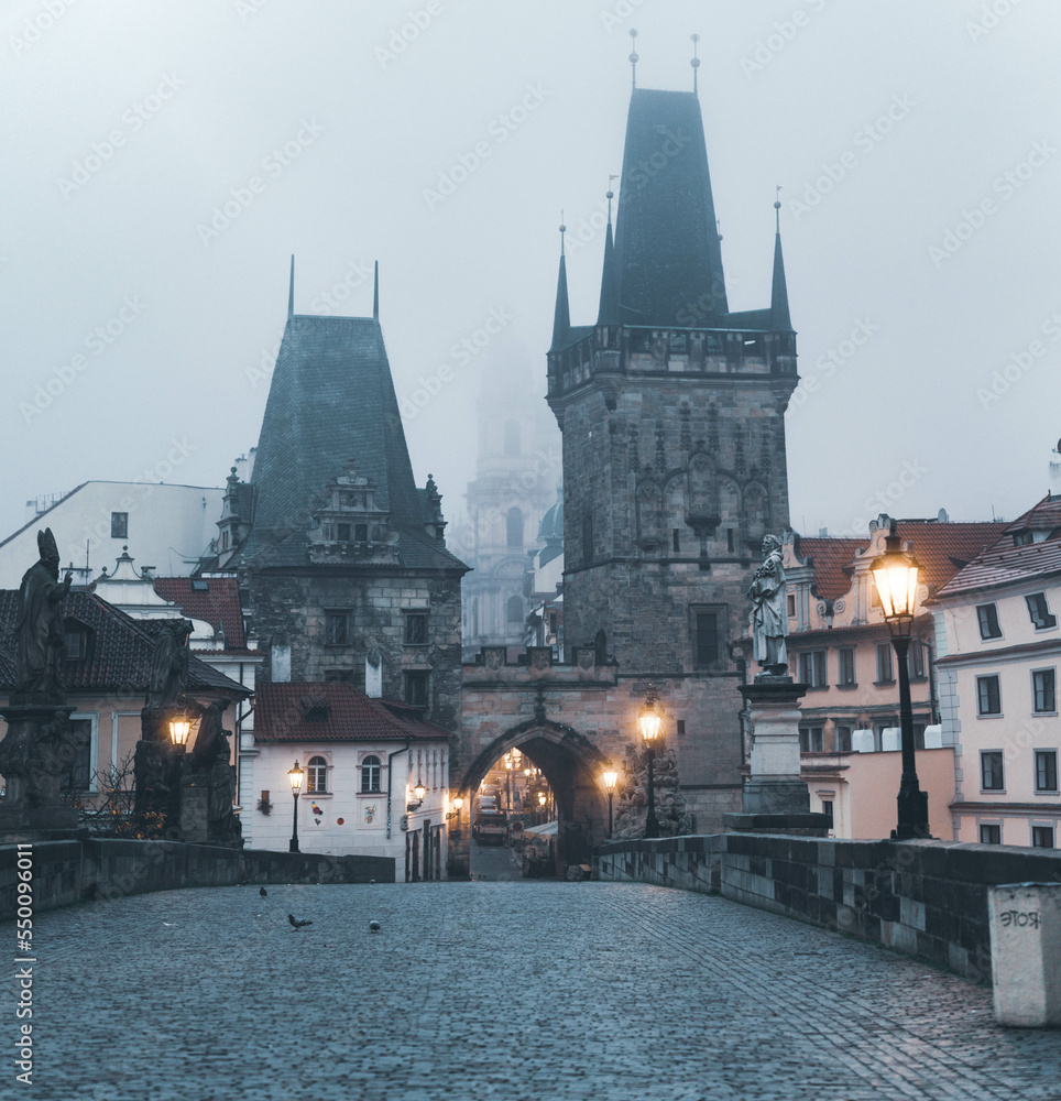 Naklejka premium Early foggy morning on Charles bridge Prague, Czech republic