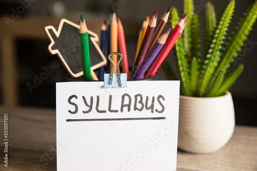 фотографія Syllabus inscription and pencils