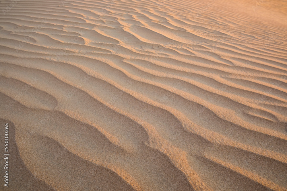 High angle view of wave pattern on sand in desert High angle view of wave pattern on sand in desert