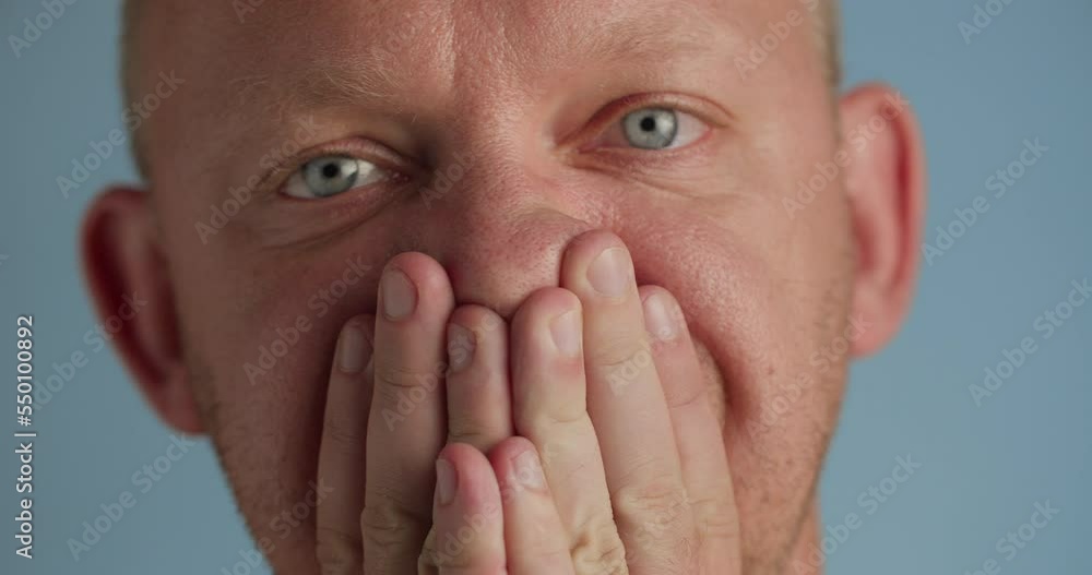 Man pinching her nose with fingers feel disgusting odor and stink, studio shot, close-up Man pinching her nose with fingers feel disgusting odor and stink, studio shot, close-up