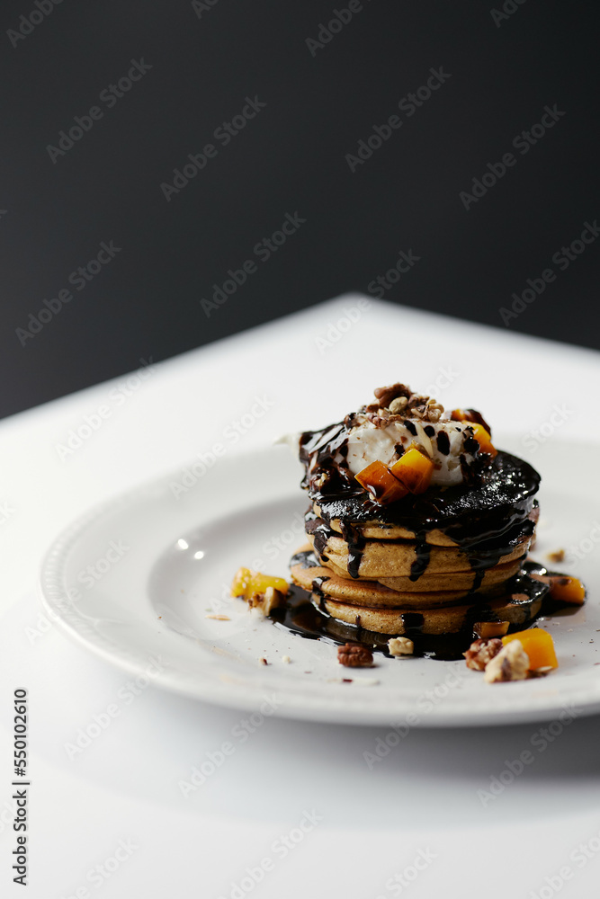 pumpkin pancakes poured with chocolate pumpkin pancakes poured with chocolate