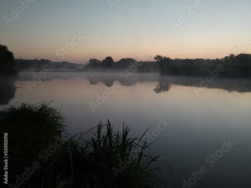 Summer morning, thick fog on the river, peace and quiet