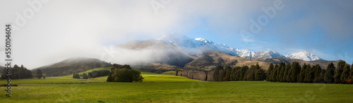 Panoramic scenery with mountains in fog, New Zealand