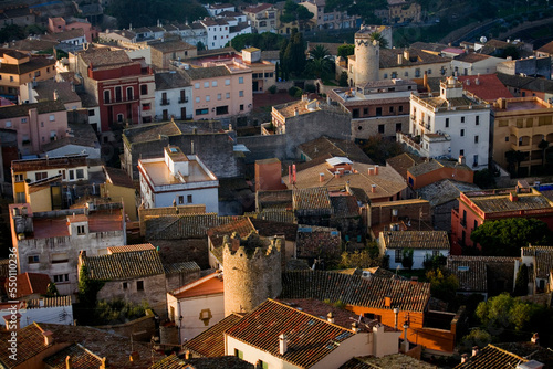 Narrow streets and old buildings in Begur, Spain. photo