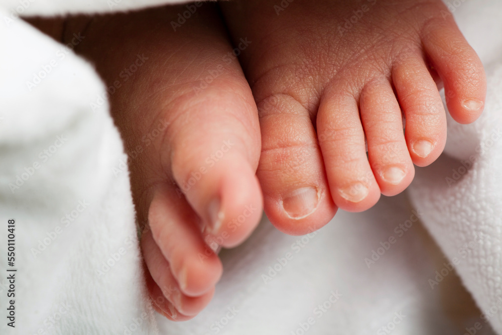 A 10 day old baby girls toes.