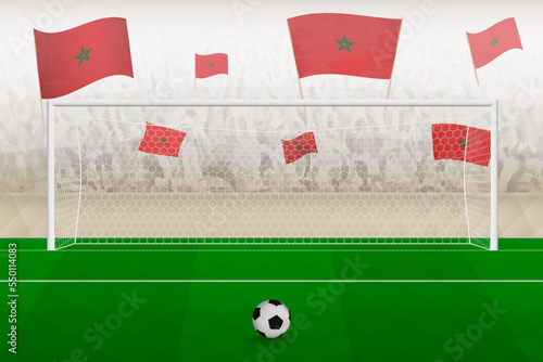 Morocco football team fans with flags of Morocco cheering on stadium, penalty kick concept in a soccer match.