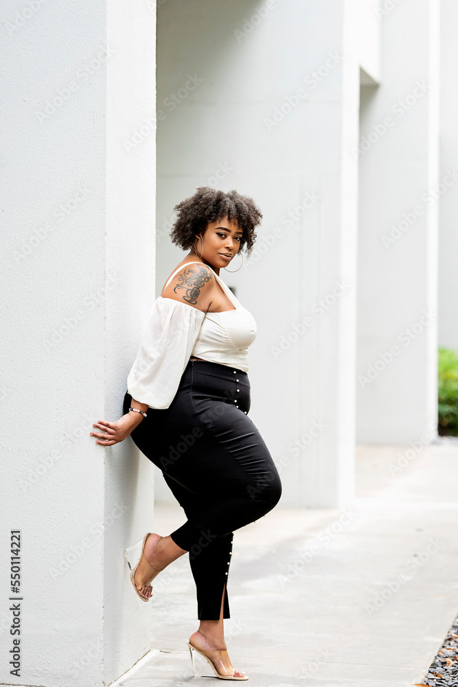 Plus size fashion forward Black woman outside Plus size fashion forward Black woman outside