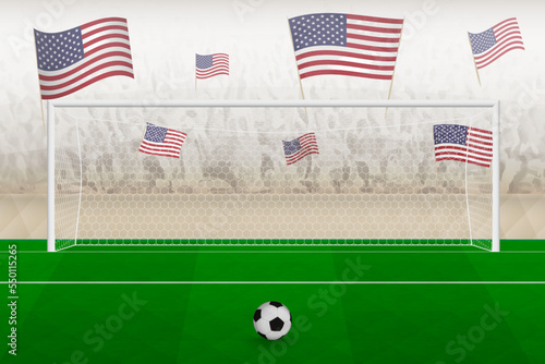 USA football team fans with flags of USA cheering on stadium, penalty kick concept in a soccer match.