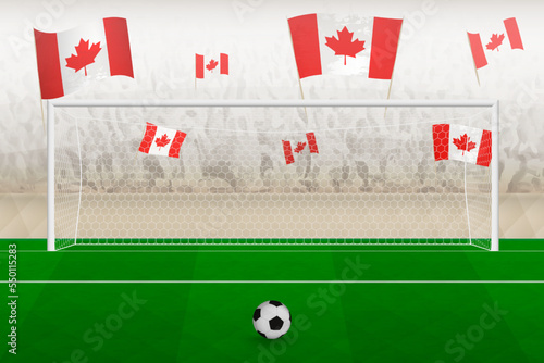 Canada football team fans with flags of Canada cheering on stadium, penalty kick concept in a soccer match.