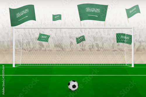 Saudi Arabia football team fans with flags of Saudi Arabia cheering on stadium, penalty kick concept in a soccer match.