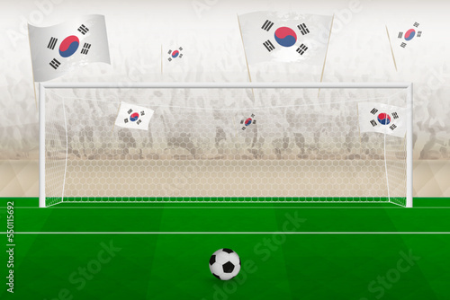 South Korea football team fans with flags of South Korea cheering on stadium, penalty kick concept in a soccer match.