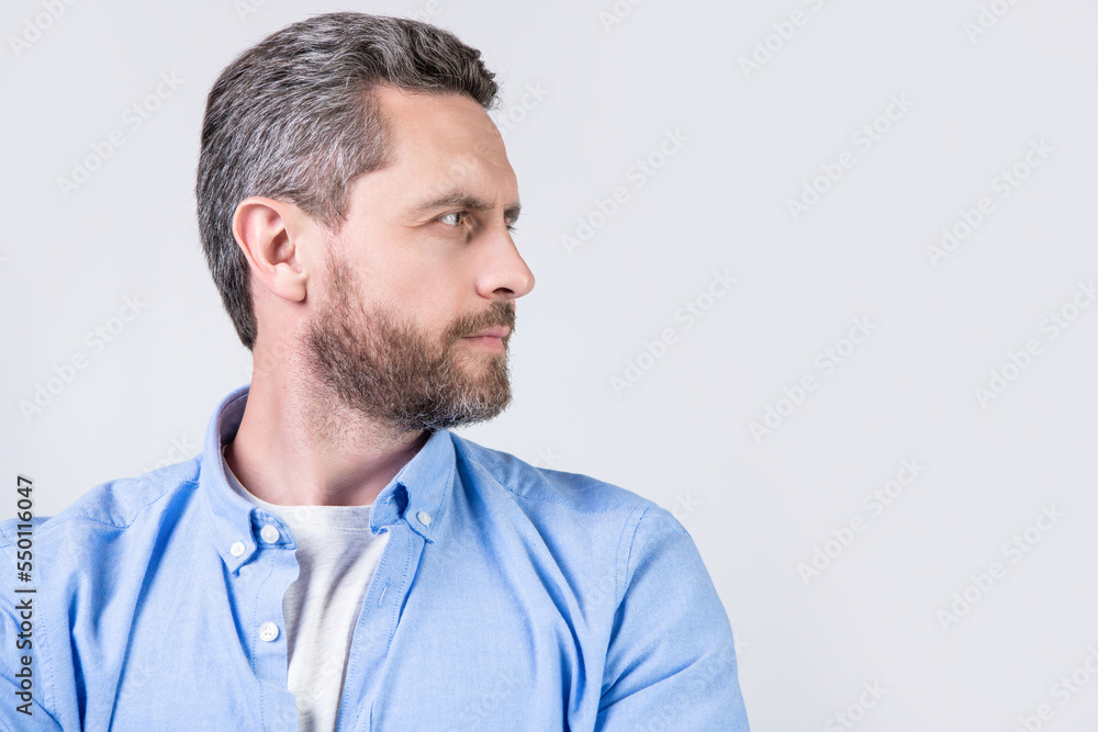photo of bearded man with beard look aside. bearded man with beard wearing casual shirt. photo of bearded man with beard look aside. bearded man with beard wearing casual shirt.