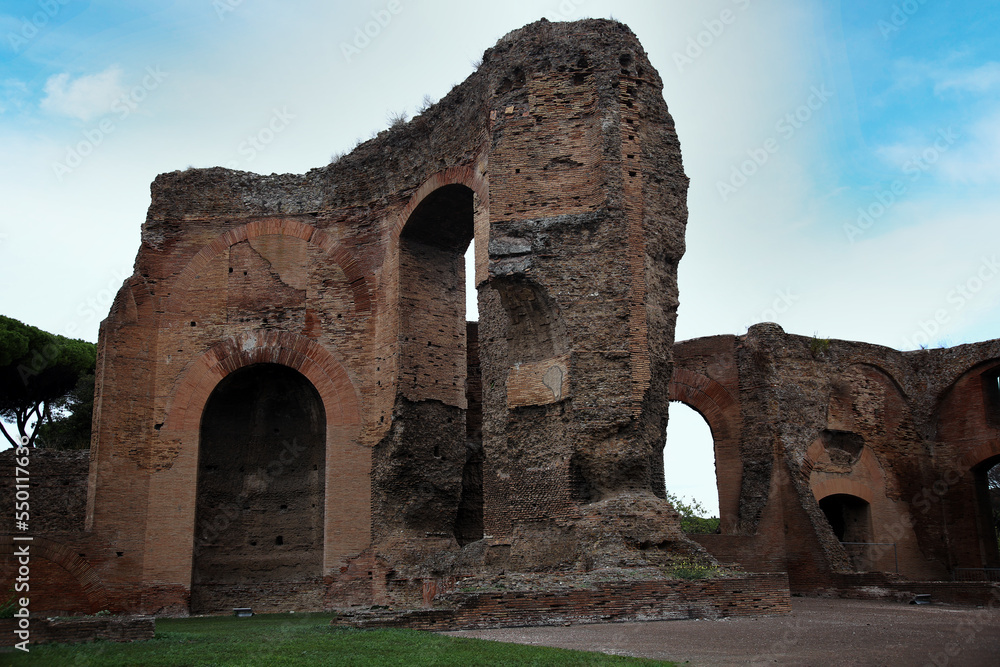 Ruins of Roman masonry with arches, in an ancient thermal plant, Rome, Italy