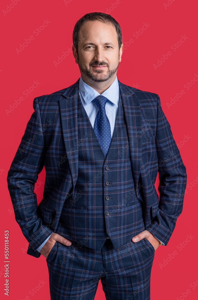 mature man director in business suit isolated on red background. business man wear suit mature man director in business suit isolated on red background. business man wear suit