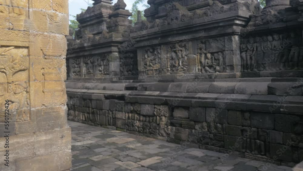 Bas-relief and carved pattern at the Buddhist Borobudur temple, in Indonesia Bas-relief and carved pattern at the Buddhist Borobudur temple, in Indonesia