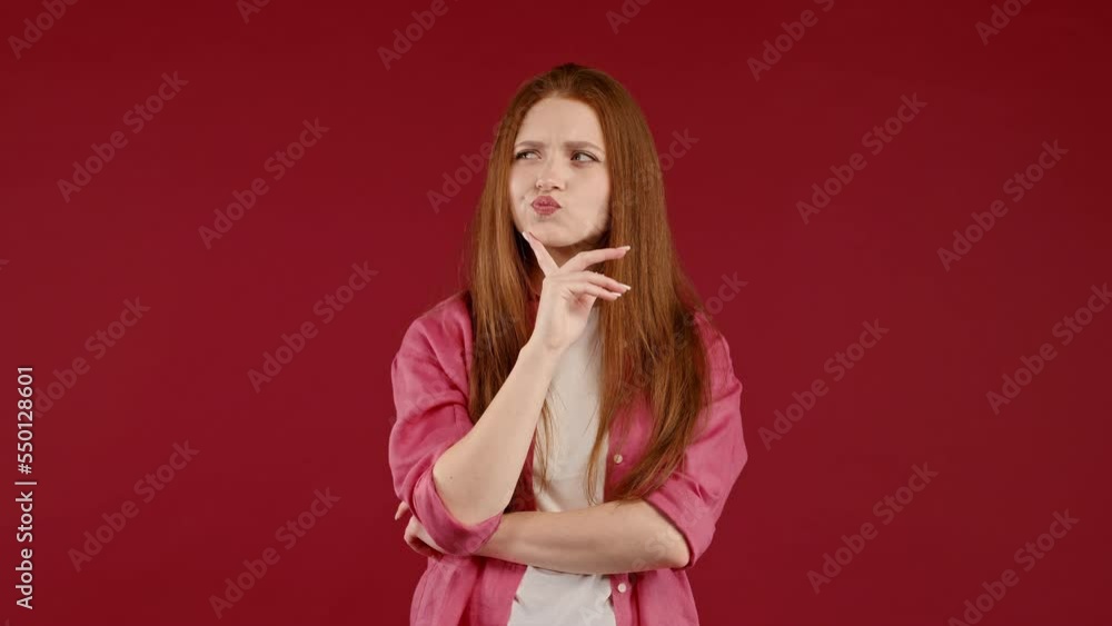 Smart student girl showing answer eureka gesture or remembered what she forgot, memory concept. Young pensive woman having idea moment, pointing finger up on red background. Smart student girl showing answer eureka gesture or remembered what she forgot, memory concept. Young pensive woman having idea moment, pointing finger up on red background.