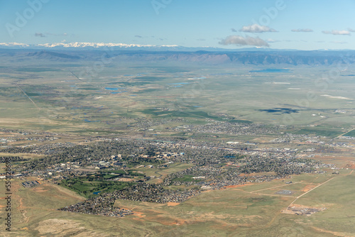 Aerial View of Laramie, Wyoming, USA with Snow Capped Mountains.