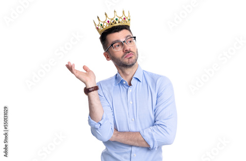 crown for egocentric boss. pensive egocentric boss in crown. studio shot of egocentric boss in crown