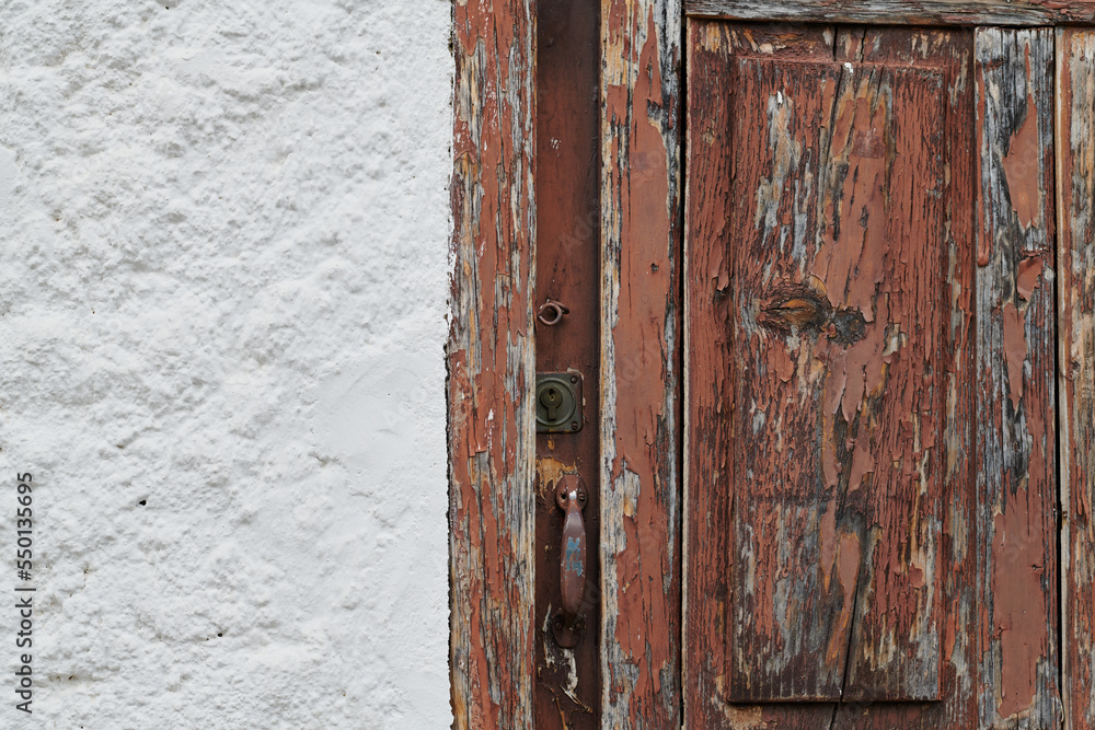 Old, picturesque main front door in mediterranean region house Old, picturesque main front door in mediterranean region house