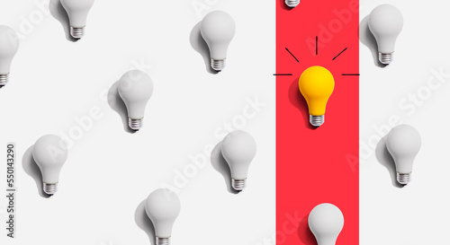 One out unique idea light bulb concept - Flat lay photo