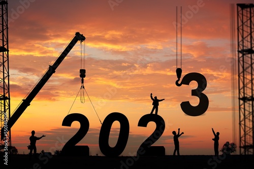 Silhouette of people team and 2023 numbers
