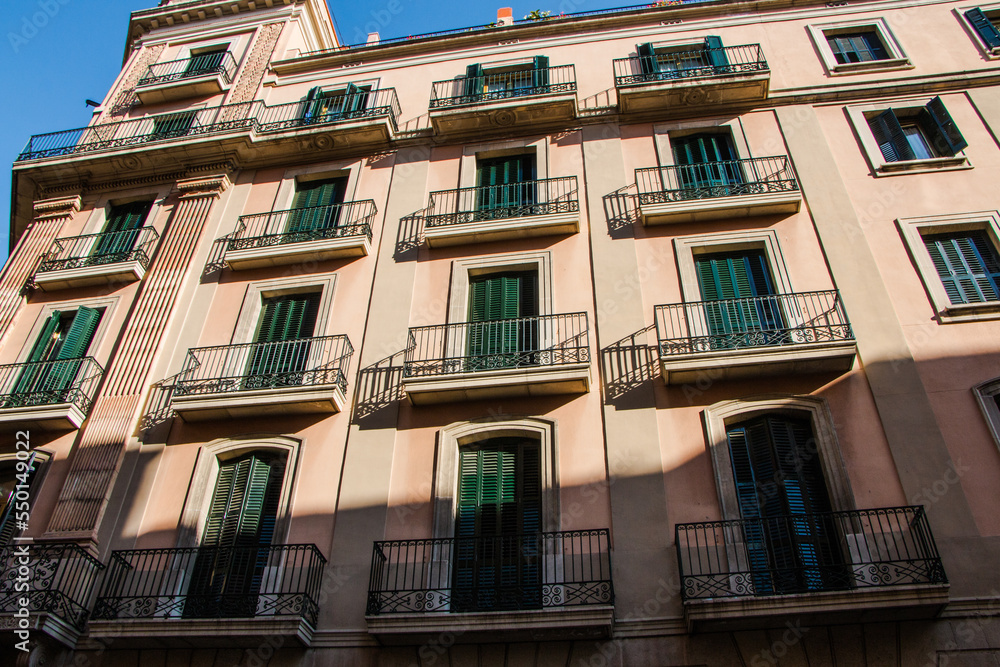 typical spanish architecture.  house with green shutters in Barcelona.  Catalonia.