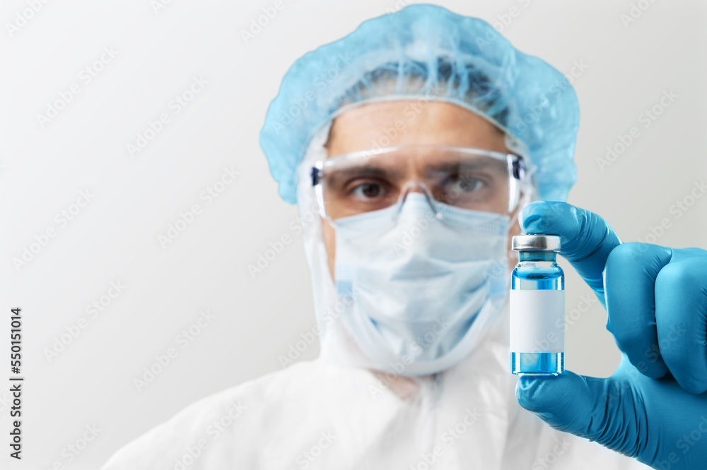 A doctor medical worker hold a vaccine A doctor medical worker hold a vaccine