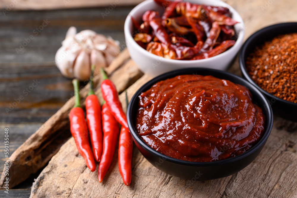 Gochujang (red chili paste), spicy and sweet fermented condiment in Korean food Gochujang (red chili paste), spicy and sweet fermented condiment in Korean food