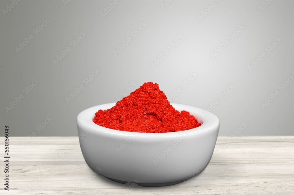 Aroma red spices powder on the desk Aroma red spices powder on the desk