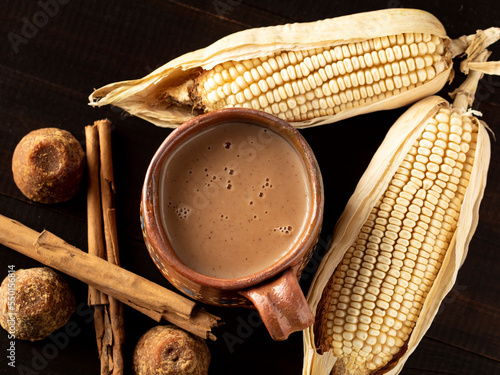 Atole de maíz con chocolate, champurrado, cocina tradicional Mexicana. photo