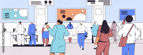 businesspeople passesngers standing back to camera rear view of business people group at subway station horizontal