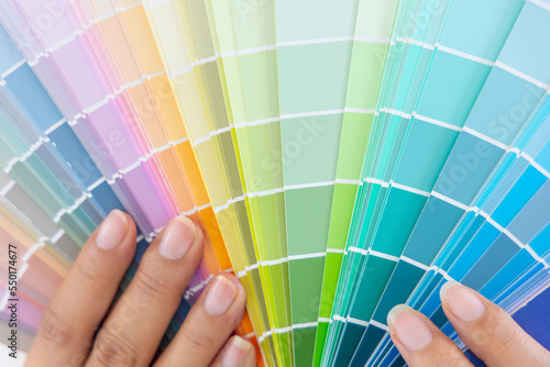 Canvas Print Close up, Female interior designer with color shades samples