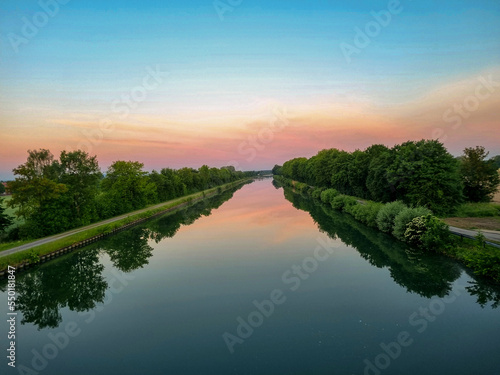 Fototapeta Naklejka Na Ścianę i Meble -  Mittelland Canal Wunstorf Kolenfeld beautiful sunrise with reflection