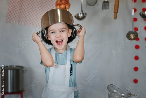 boy with a pot on his head