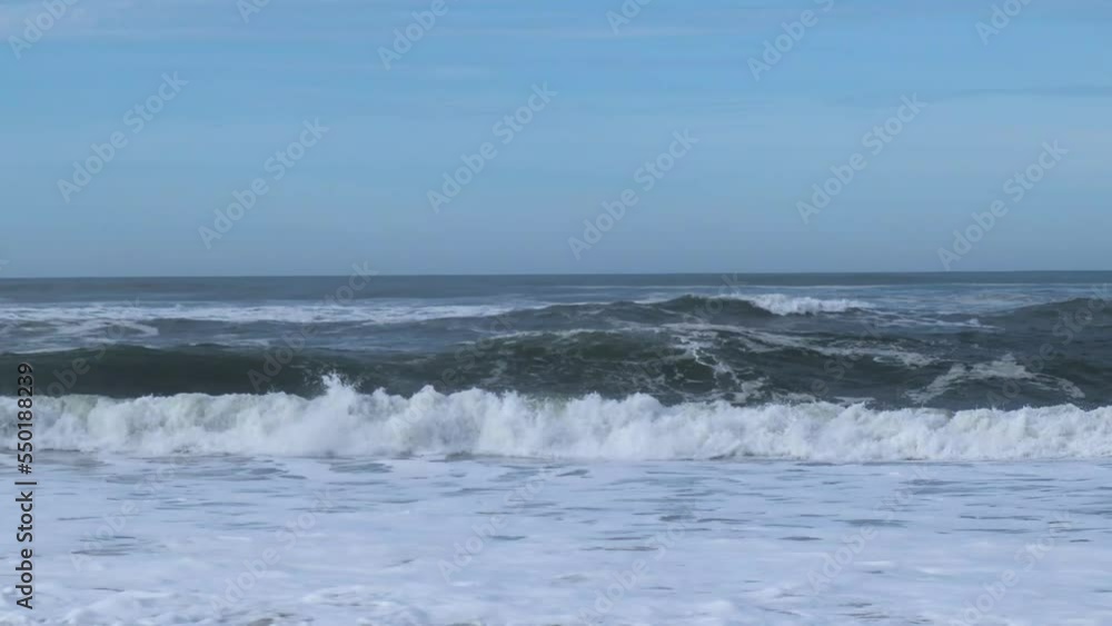 Rough Atlantic Ocean waves at Portuguese shoreline on popular surf beach, Nazare, Portugal Rough Atlantic Ocean waves at Portuguese shoreline on popular surf beach, Nazare, Portugal
