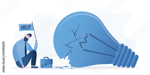 Unsuccessful brainstorming, concept. Overcoming difficulties, no new ideas, lack of creativity. Unhappy businessman sitting near broken light bulb and need help. Mental crisis