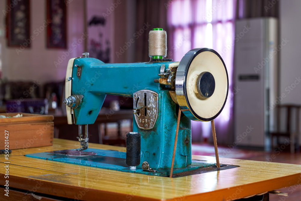Fototapeta premium Closeup of a vintage traditional home sewing machine
