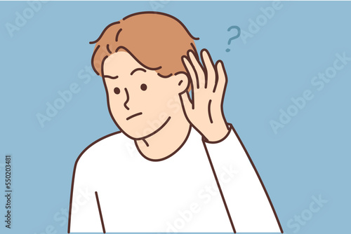 Young man listen to hidden information 