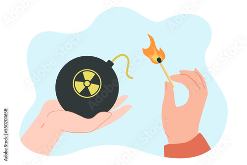 Hands holding bomb with radiation symbol and burning match. People detonating nuclear bomb flat vector illustration. Explosion, danger, weapon concept for banner, website design or landing web page