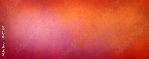 Colorful orange pink and purple background, distressed grunge texture, abstra...